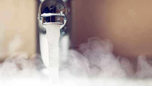 why is my hot water cloudy but cold water clear